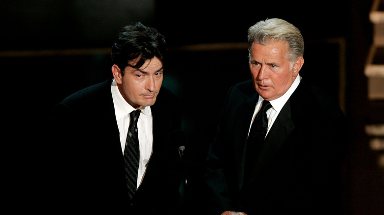 Charlie Sheen speaking on stage with Martin Sheen