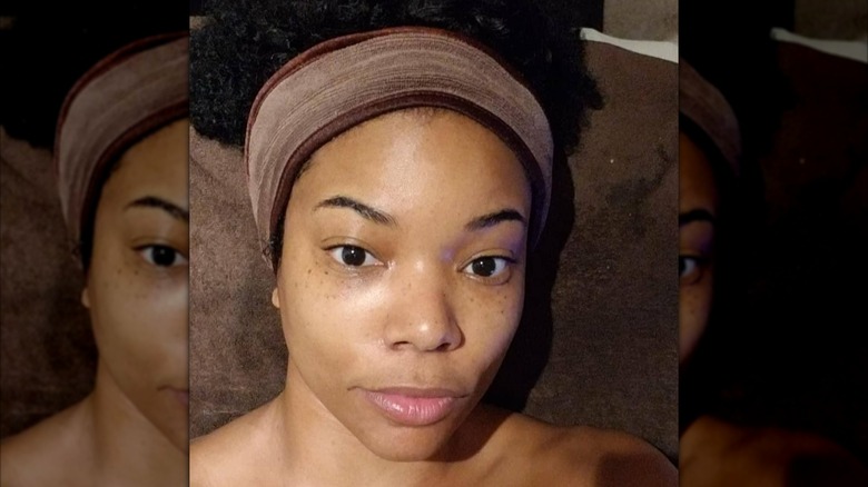 Gabrielle Union with no makeup and her hair pulled back