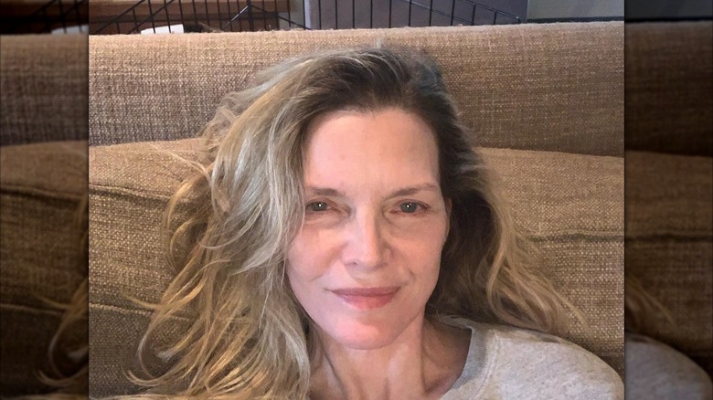 Michelle Pfeiffer taking a close-up selfie