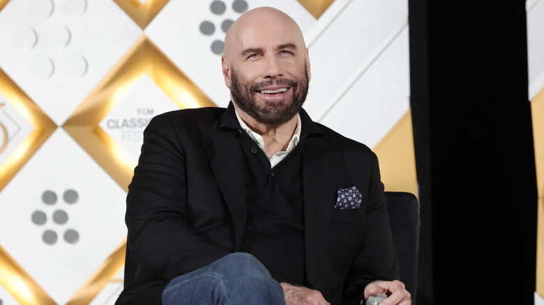 John Travolta speaks onstage at the Opening Night Gala and 30th Anniversary Screening of "Pulp Fiction" during the TCM Classic Film Festival at TCL Chinese Theatre (2024)