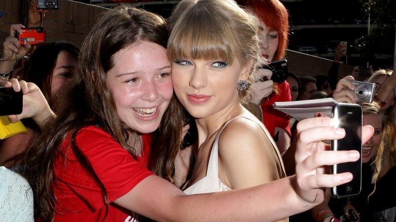 Taylor Swift with fan