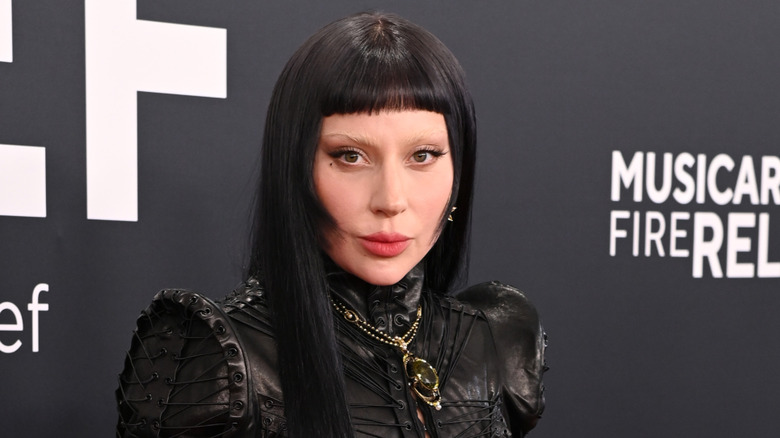 Lady Gaga with a micro fringe and long black hair