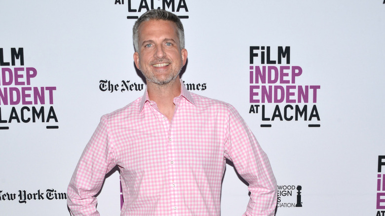 Bill Simmons smiling at the cameras during a red carpet event
