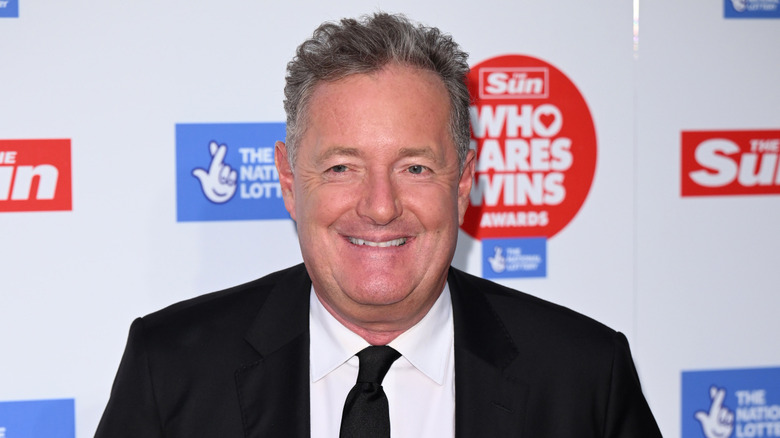 Piers Morgan smiling at the camera