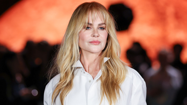 Nicole Kidman in white shirt with long hair and bangs