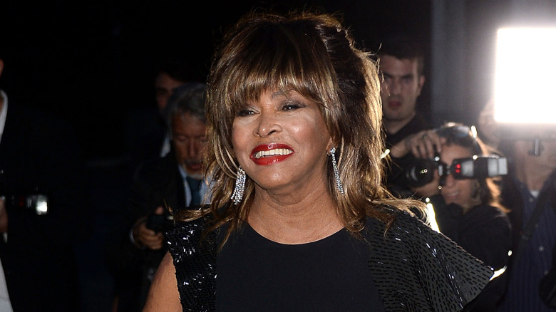 Tina Turner in a black dress in 2013