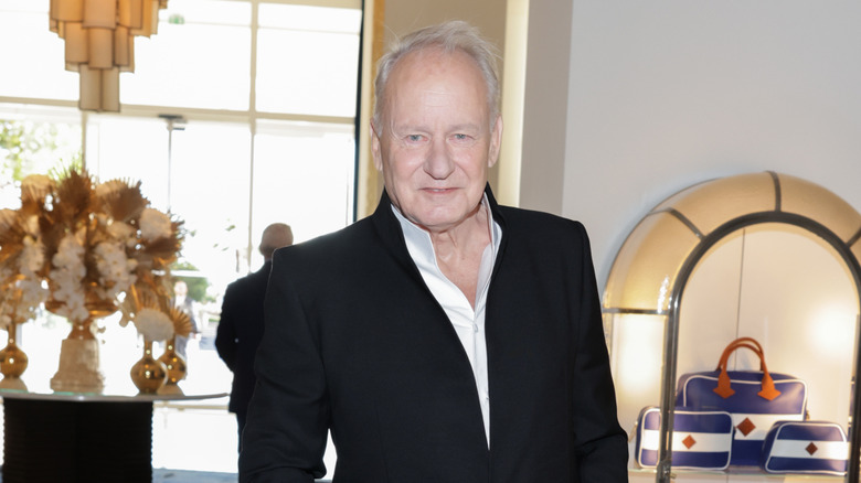 Stellan Skarsgård wearing a black suit with white shirt at an event in May 2026