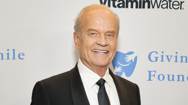 Kelsey Grammer smiling on the red carpet in December 2025