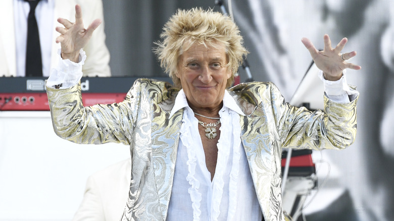 Rod Stewart with his armed outstretched in April 2026