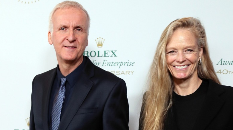 James Cameron and Suzy Amis smiling at an awards show