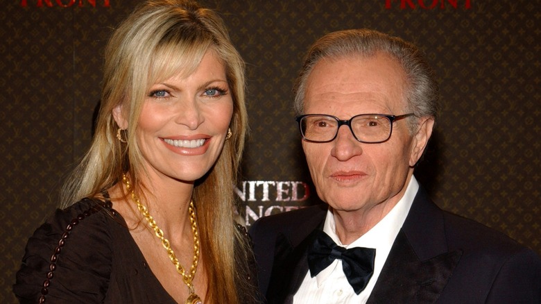 Larry King and Shawn King attending a charity event.