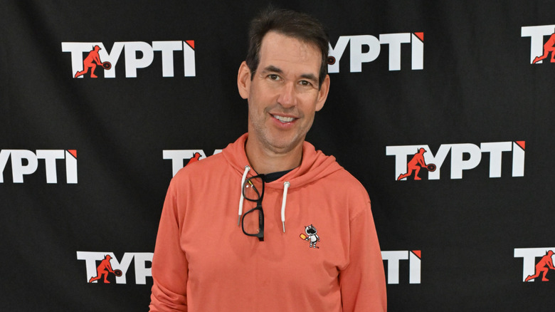 Doug Ellin posing on step-and-repeat