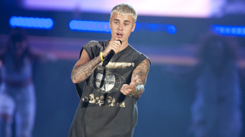 Justin Bieber singing on stage