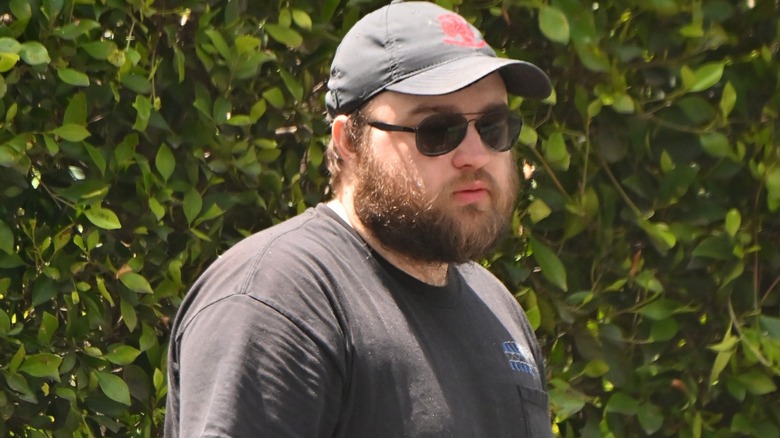 Angus T Jones is seen running errands on April 18, 2024