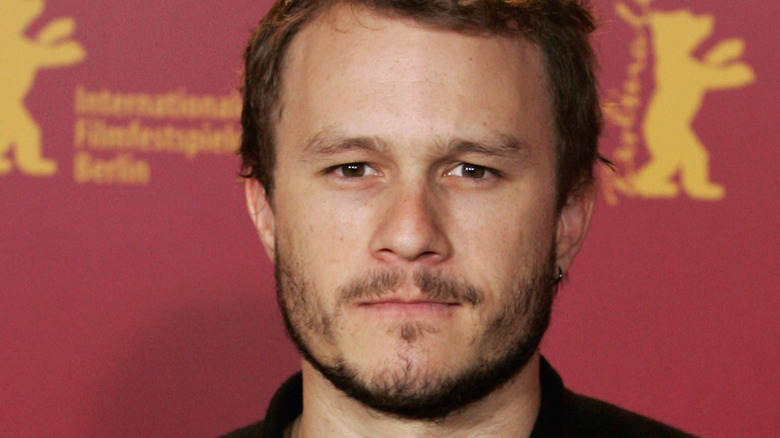 Heath Ledger with a light beard and an earring