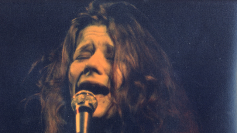 Janis Joplin singing onstage