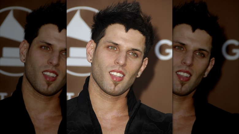 Devin Lima smiling at the Grammys