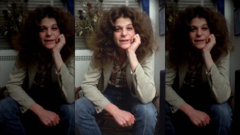 Gilda Radner with her chin resting in her hand