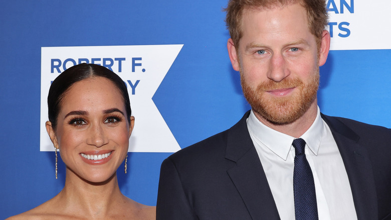 Harry and Meghan at event