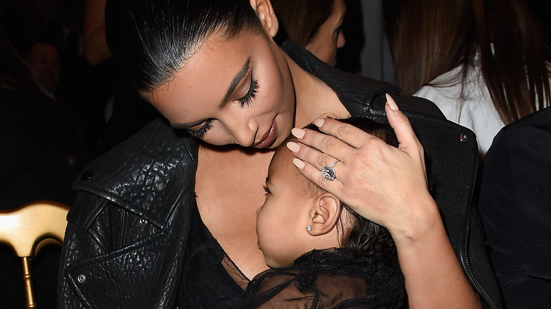 Kim Kardashian with child