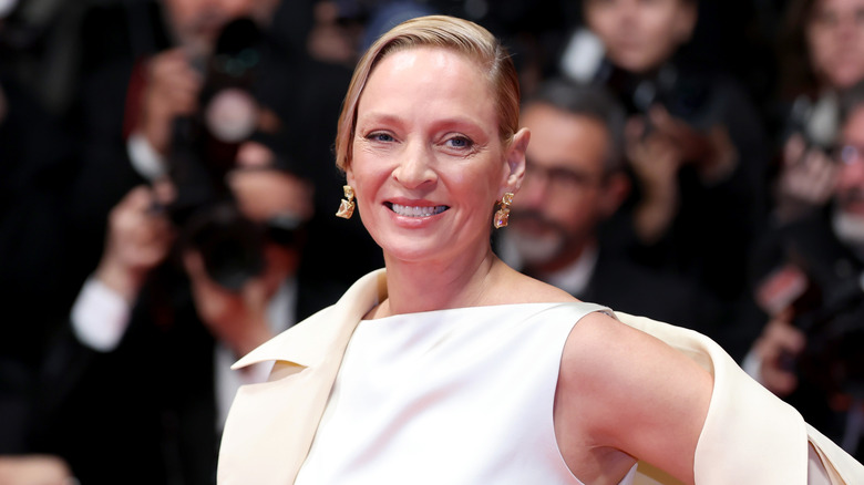Uma Thurman in white gown at the Cannes Film Festival