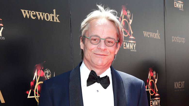 Mitchell Anderson posing on the Daytime Emmys red carpet in 2019