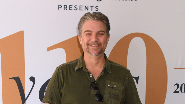 Jeremy Miller smiling at an event in 2023