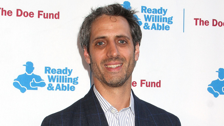 Josh Saviano smiling at an event in 2015