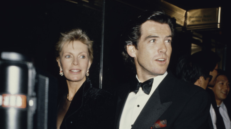 Pierce Brosnan and Cassandra Harris in black formals