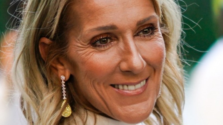 Celine Dion posing during the 2019 Paris Fashion Week