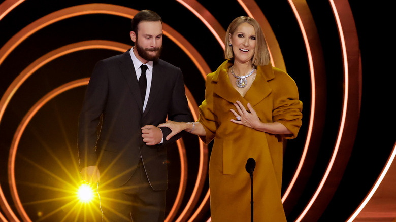 René-Charles Angélil walking with Céline Dion