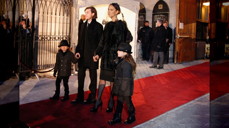 Celine Dion walking with her sons
