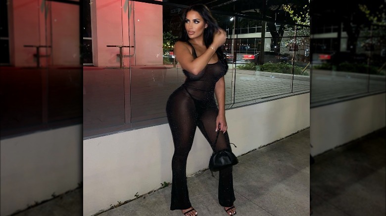 Chaney Jones poses in a sparkly bodysuit