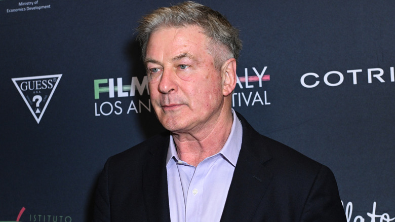 Alec Baldwin wearing black and blue