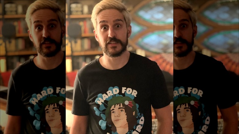 Eric Lloyd wears a Christmas shirt