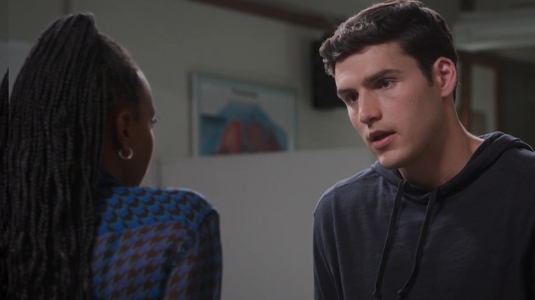 Charlie Hall acting in a Sex Lives of College Girls classroom scene.