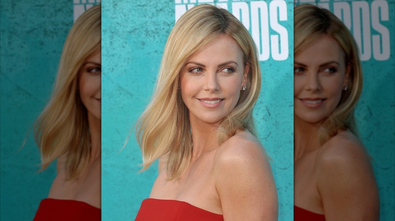 Charlize Theron poses at the 2012 MTV Movie Awards