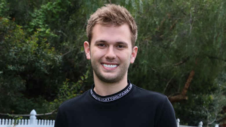 Chase Chrisley smiling outside