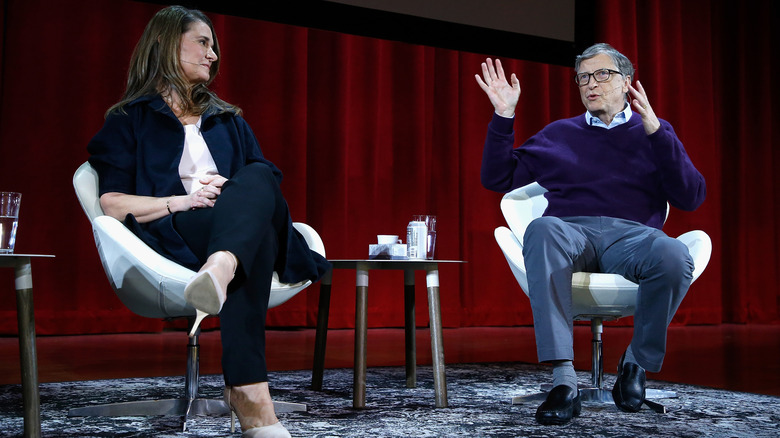 Melinda French Gates looking at Bill Gates while he talks