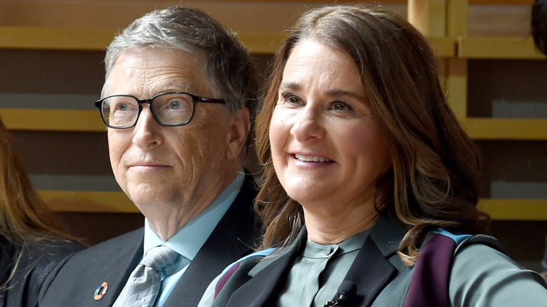 Bill Gates looking thoughtful and Melinda French Gates smiling