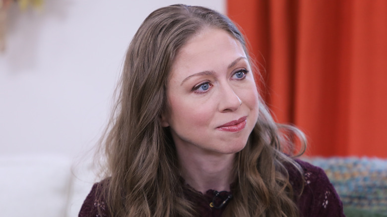 Chelsea Clinton with a neutral expression