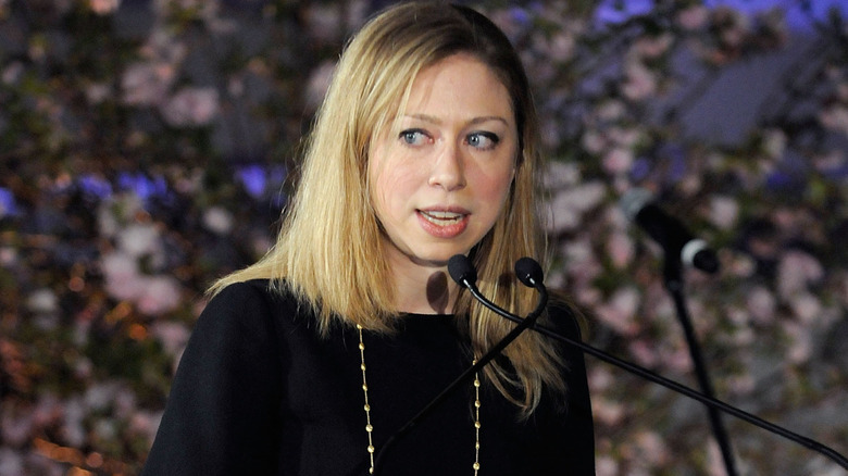 Chelsea Clinton presenting her mother onstage in 2011
