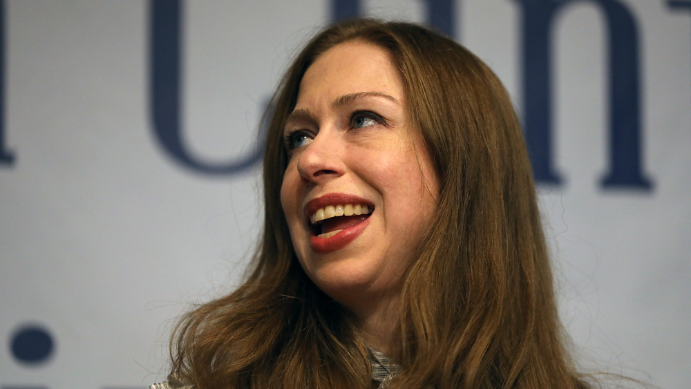 Chelsea Clinton smiles at event