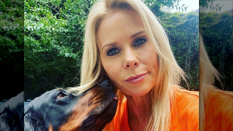 Cheryl Hines outside with dog