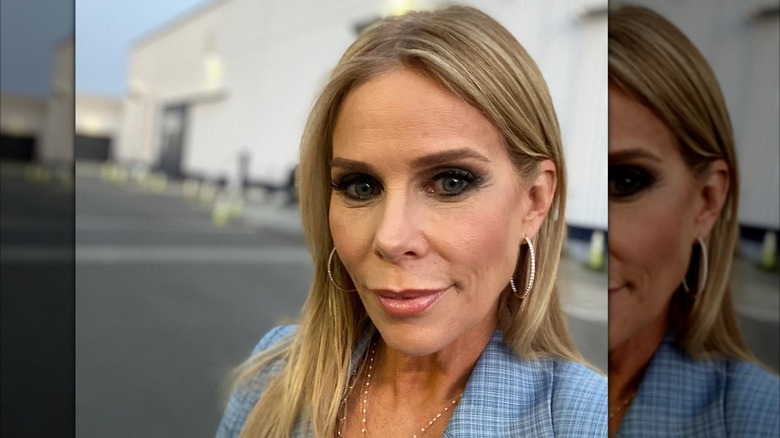 Cheryl Hines outside set at dusk