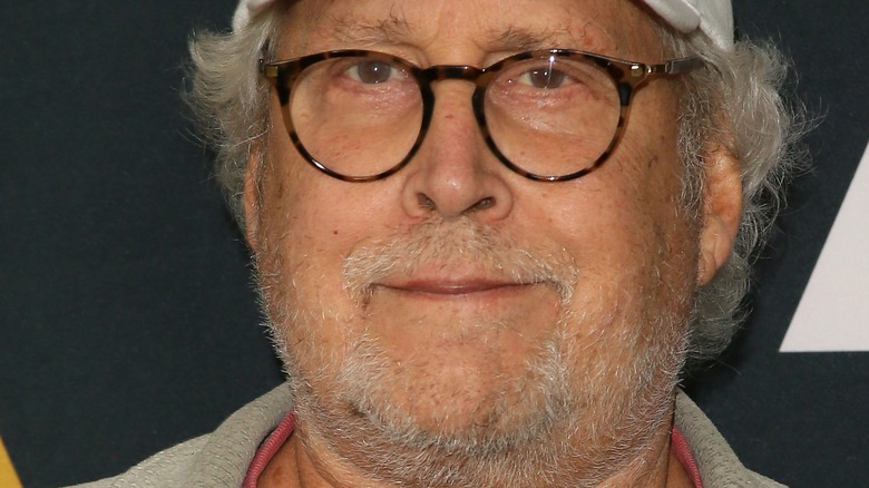 Chevy Chase close up wearing glasses