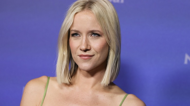 Jessy Schram posing on the red carpet