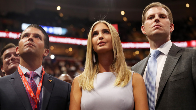 Donald Trump Jr., Ivanka Trump, and Eric Trump look up