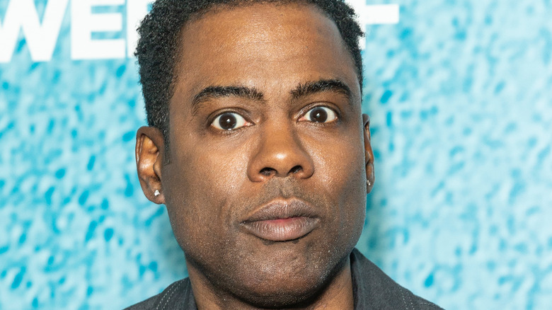 Chris Rock posing