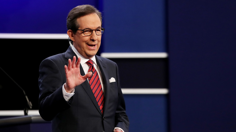 Chris Wallace attends a presidential debate.